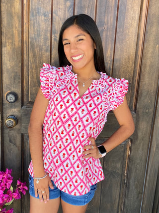 Beatrix Flutter Top Pink – Small	Beatrix flutter sleeve top in pink – size small women’s top with ric rac trim and smocked neckline