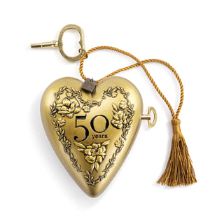 Gold heart-shaped lock with '50 years' engraving and tassel