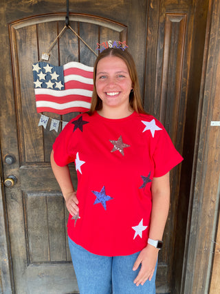Red Starburst Graphic Tee
Red patriotic starburst graphic tee for women – festive Fourth of July top with black and silver sequin stars