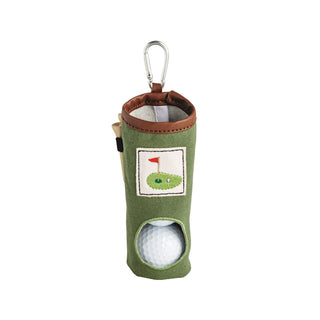 Green golf ball holder with a golf ball inside