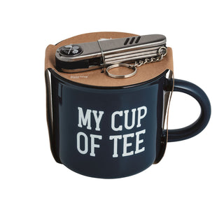 Blue mug with 'MY CUP OF TEE' text, keychain, and car keys on a white background