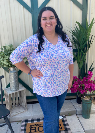 Purple Abstract Chicago Top	Purple abstract Chicago top – printed blouse with purple, blue, and blush brushstroke pattern