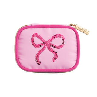 Pink pill pouch with a bow design