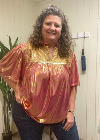 Sugar Plum Top	Sugar Plum top – plum colored short sleeve blouse with pleated front and flutter sleeves