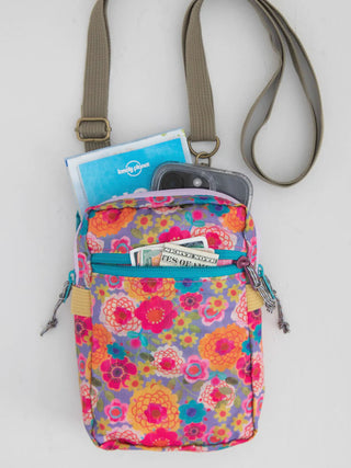 Multifunction grey 8-in-1 crossbody bag with adjustable strap and multiple compartments.