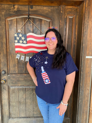 Navy Star Graphic Tee
Navy blue patriotic star tee for women – silver and white sequin stars on short sleeve Fourth of July shirt