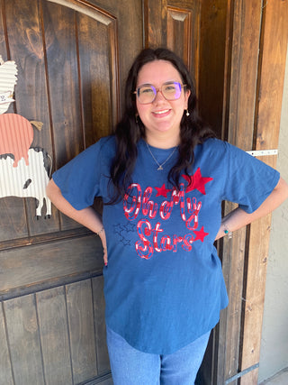 Oh My Stars Basic Tee
“Navy blue patriotic graphic tee for women – Oh My Stars Fourth of July shirt with red and silver sequin stars”