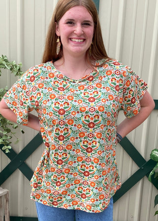 Basic Tee Sunset Fiesta	Basic sunset fiesta tee – soft multicolor short sleeve top with fiesta-inspired geometric print