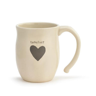 Beige mug with a heart and 'teacher' text