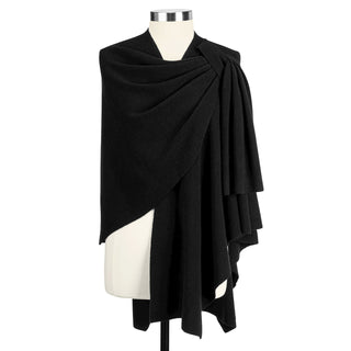 A black draped wrap or shawl displayed on a white mannequin torso against a plain white background.