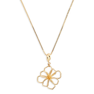 Gold necklace with a floral pendant on a white background