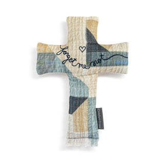 Patchwork-style soft cross with 'forget me not' text on a white background