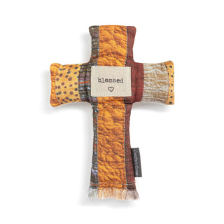 Decorative stuffed cross with 'blessed' 