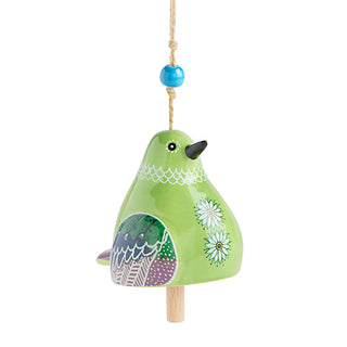 Decorative green bird ornament with floral patterns on a white background
