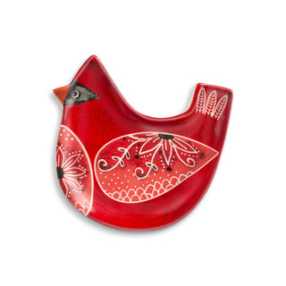 Red ceramic bird-shaped plate with white patterns on a white background