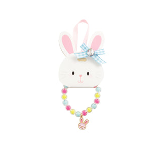 Children's jewelry set with a bunny and colorful bead bracelet on a white background