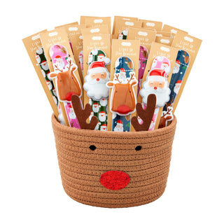 A woven, brown reindeer-themed basket featuring a red glittery nose, black eyes, and felt antlers, filled with an assortment of individually packaged Christmas "Light Up Slap Bracelets" featuring Santa Claus and Rudolph the Red-Nosed Reindeer designs.