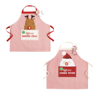 Two red-and-white striped holiday aprons: one featuring a reindeer that says "Official Baking Crew," and another featuring Santa Claus that says "Official Cookie Tester."