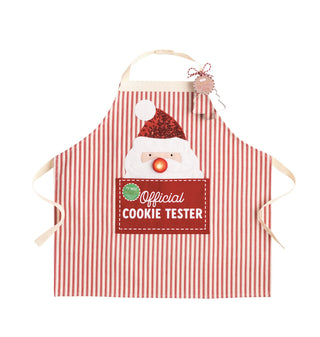 A red-and-white striped holiday apron featuring a Santa Claus graphic and a large front pocket that reads "Official COOKIE TESTER."