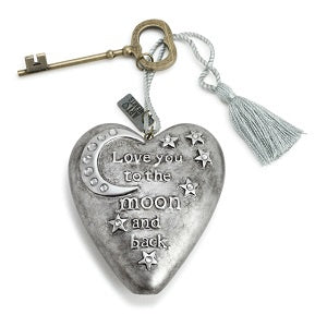 Heart-shaped pendant with key, tassel, and 'Love you to the moon and back' text 