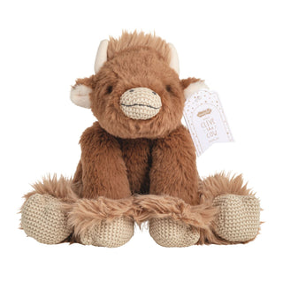 A fluffy, brown highland cow plush toy sitting down, featuring small horns, knit textured hooves and snout, and a tag that reads "meet Clive the cow."