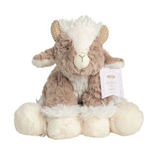 Plush toy goat with a tag on a white background