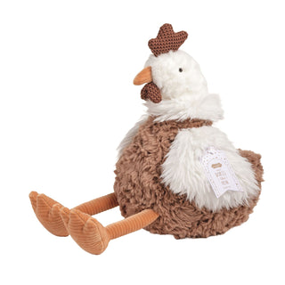 Plush toy chicken with a cowboy hat on a white background