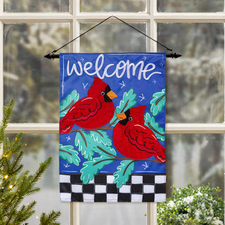 Decorative garden flag with red cardinals and 'welcome' text.