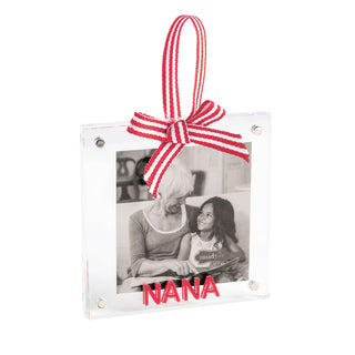 A square acrylic photo frame ornament labeled "NANA" in red lettering, featuring a red-and-white striped hanging ribbon and bow.