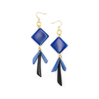 Blue and black earrings with gold hooks on a white background