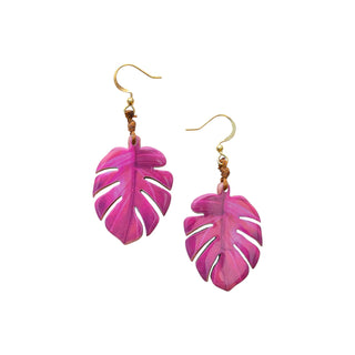 Pink leaf-shaped earrings on a white background