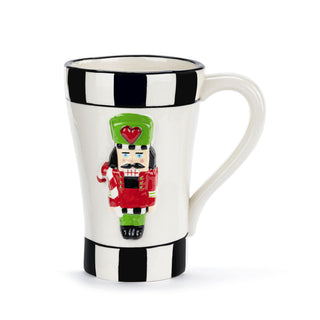 White mug with black and white checkered band, featuring a nutcracker design