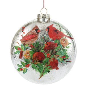 Clear glass Christmas ornament with red cardinals and winter elements