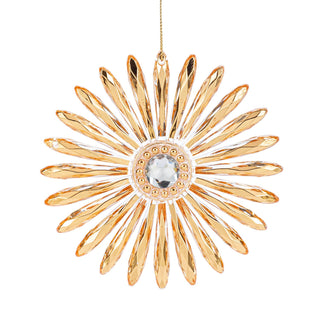 Gold sunflower-shaped ornament with a central gem 