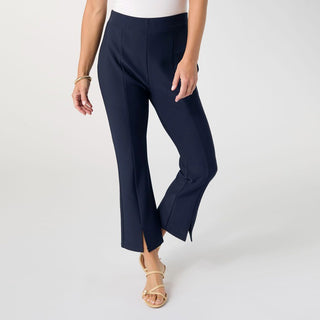 Navy blue pants worn by a person on a white background