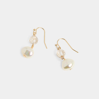 A pair of gold-tone fish hook drop earrings, each featuring a small faceted round bead above a larger rounded iridescent pearl-style bead, shown in the Pearly White colorway against a white background.
