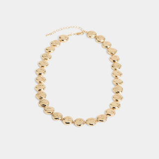 A collar-length necklace composed of a continuous strand of round, slightly irregular hammered-finish disc links connected by a lobster-claw clasp with an adjustable extender chain.