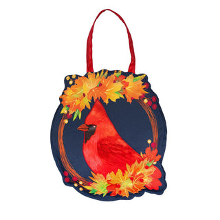 Decorative hanging sign with a red cardinal and autumn leaves on a white background