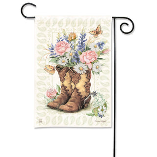 Decorative garden flag with cowboy boots and flowers on a white background