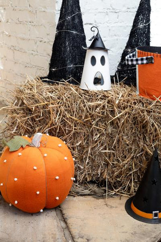 Plush orange pumpkin with white fabric beads