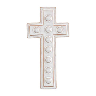 Decorative cross with circular patterns on a white background