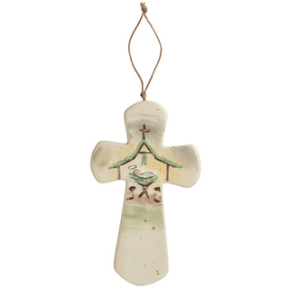 Decorative cross ornament with a nativity scene design