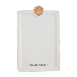 White tray with decorative edge and 'Take it or leave it' text
