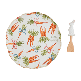 Carrot Pattern Platter Set Round plate with carrot pattern and a wooden spatula on a white background