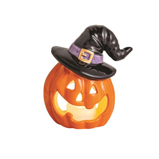 Halloween-themed pumpkin votive with a witch hat 