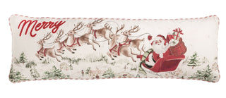 Decorative pillow with Santa Claus and reindeer design, featuring the word 'Merry'.