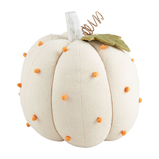 White pumpkin with orange dots and a green leaf 