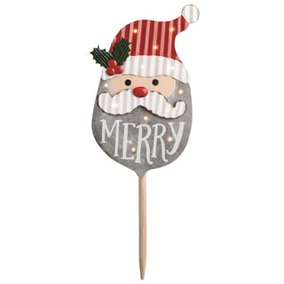 Decorative Christmas sign with Santa face and 'Merry' text