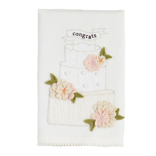 Decorative card with a cake and flowers design, featuring the word 'congrats'.