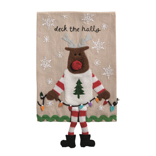Decorative towel with a reindeer design and 'deck the halls' text on a beige background with snowflakes.